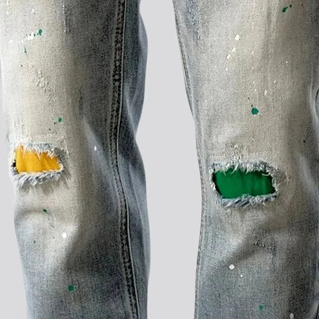 Grunge men's distressed jeans